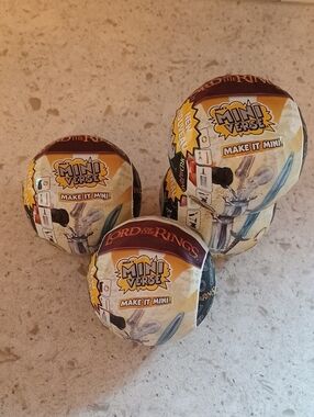 Set Of 4 Brand New Lord of the Rings Surprise Mini Verse Balls